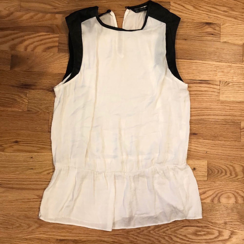 White blouse with leather detail